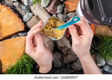 Cooked tourist food. Freeze-dried pasta in a bag. Food for tourists. Food is in the hands of the tourist. Tourist composition. - Shutterstock ID 2168309877