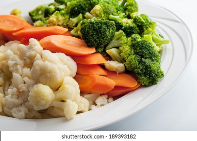 Cooked Vegetables: Cauliflower, Carrot And Broccoli.