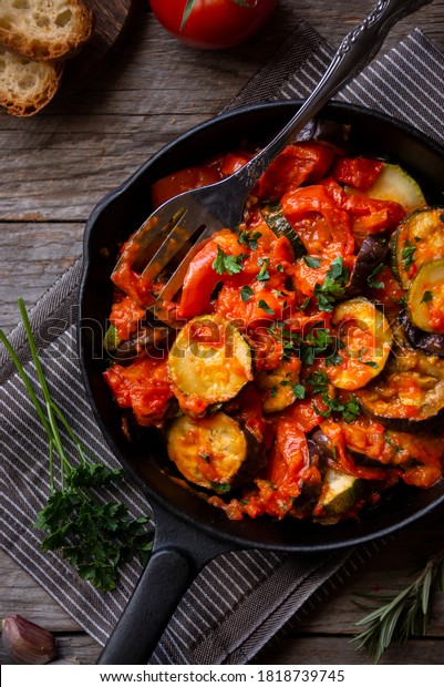 Cooked vegetables in frying pan, french\
ratatouille, vegetable\
dish\
