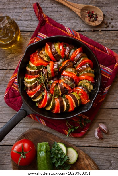 Cooked vegetables in frying pan, french\
ratatouille, vegetable\
dish\
