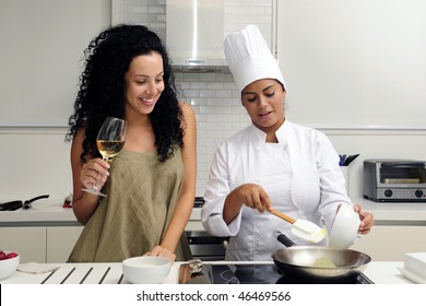 Cookery Course: Pouring Wine Into A Pan With Risotto