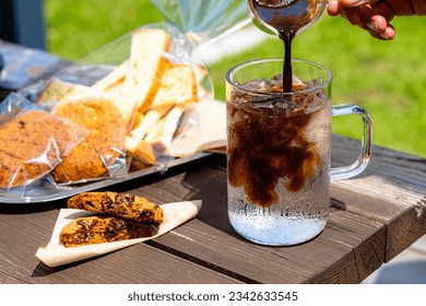 cookie, bread and ice coffee outside