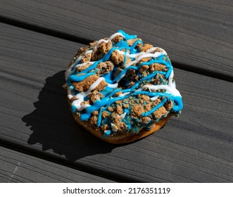 Cookie Crumb Blue Doughnut On Wood