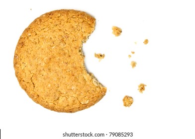 Cookie with crumbs overhead view isolated on white