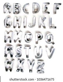 Cookie Cutter Letters Isolated On A White Background.