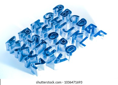 Cookie Cutter Letters Isolated On A White Background.