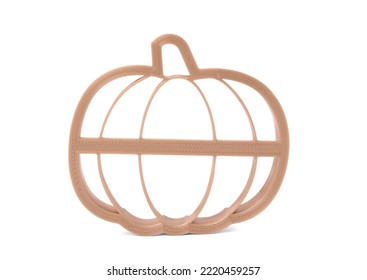 Cookie cutter in shape of pumpkin isolated on white
