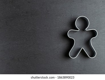 cookie mold in the form of a man on ardesia - Powered by Shutterstock