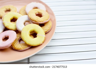 Cookie shapes donut on metal cooling rack - Shutterstock ID 2174077513