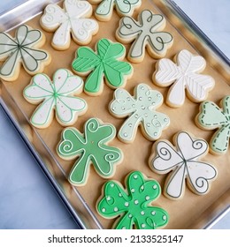 A Cookie Sheet Full Of Yummy Shamrock Sugar Cookies.