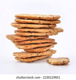 The cookie tower. A stack of chip cookies on a white background