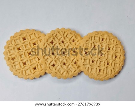 Cookies or biscuits with a distinctive geometric pattern