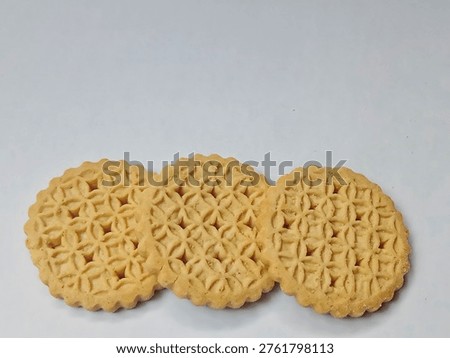 Cookies or biscuits with a distinctive geometric pattern