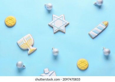 Cookies For Hanukkah Celebration And Christmas Decor On Color Background