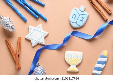 Cookies For Hanukkah Celebration And Christmas Decor On Color Background