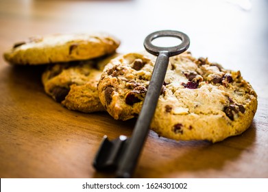 Cookies with a key to illustrate cookie banners for websites