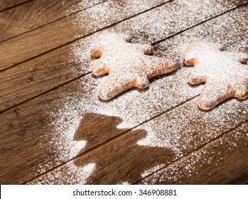 Cookies In Shape Of Christmas Tree On Wooden Background