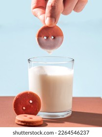 Cookies are soaked in a glass of milk