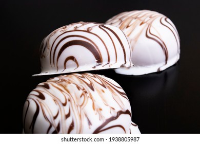 Cookies In White Glaze On A Wooden Table Lose Up