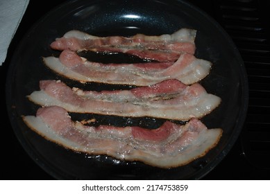 Cooking Bacon On Coated Stovetop Pan