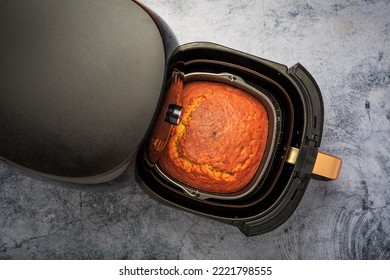 Cooking and baking in airfryer - homemade pumpkin apple cake - Shutterstock ID 2221798555