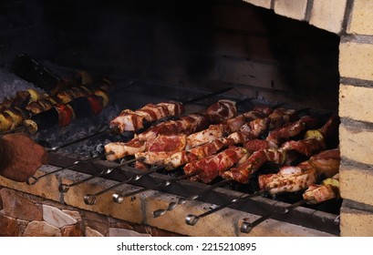 Cooking Barbecue In The Fireplace. Shallow Depth Of Field