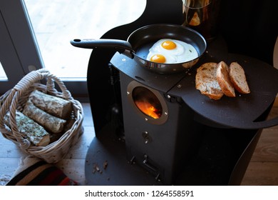 cooking breakfast on the stove - Shutterstock ID 1264558591