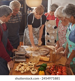 Cooking class, food and old people with chef in kitchen for nutrition, diet or easy recipe in retirement. Nursing home, learning and nutritionist volunteer show senior group traditional pasta meal - Powered by Shutterstock