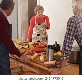 Cooking class, learning and mature chef with senior people in kitchen for help, guide or how to questions, advice or steps. Food, health and nutritionist with audience for teaching, diet or nutrition - Powered by Shutterstock