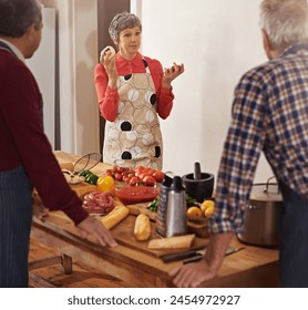 Cooking class, teaching and mature chef with senior people in kitchen for help, guide or how to questions, advice or steps. Food, health and nutritionist with audience for learning, diet or nutrition - Powered by Shutterstock