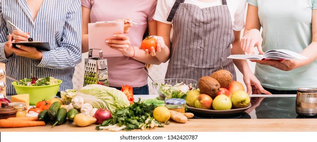 Cooking Classes. Food Preparing Hobby. Group Of Women Learning Healthy Eating Lifestyle And Balanced Nutrition.