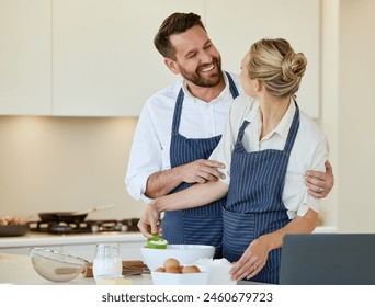 Cooking, couple and hug in kitchen of home with laptop for learning recipe together on vacation. Happy, chef and partner baking with support, help and care in marriage with meal prep of food - Powered by Shutterstock