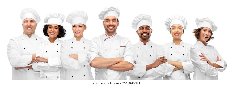 cooking, culinary and profession concept - international team of smiling chefs with crossed arms - Shutterstock ID 2165945381