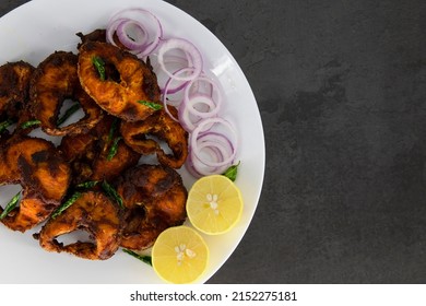 
Cooking deep frying of crispy tasty fish south indian tamilnadu homemade chettinad style.
Deep South Indian spicy fish fry on a plate with isolated background. Fresh spicy fish fry South Indian type.