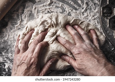 Cooking dough by elderly woman cook hands for homemade pastry bread, pizza, pasta recipe preparation on table background. - Powered by Shutterstock