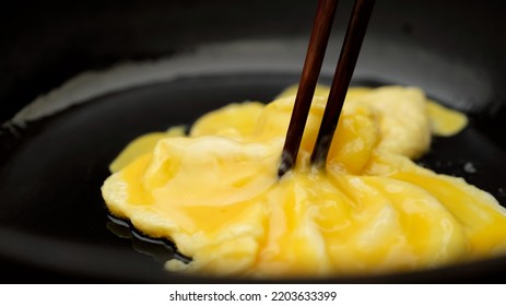 Cooking Fluffy Scrambled Eggs Close Up