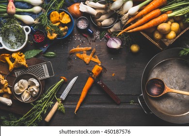 Cooking With Forest Mushrooms And  Vegetables Ingredients And Kitchen Tools, Preparation On Dark Rustic Wooden Table, Top View