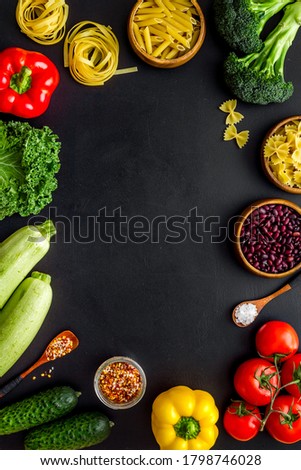 Cooking frame background with vegetables - flat lay from above