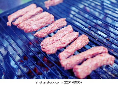 Cooking Grilled Minced Meat Rolls In Row