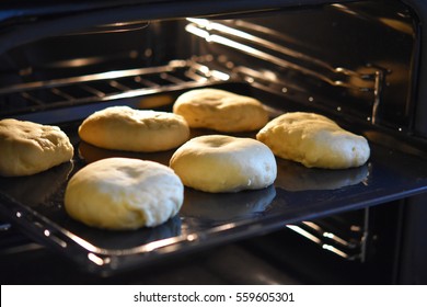 Cooking Handmade Bread Inside A Home Oven.