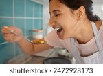 Cooking, happy and woman in kitchen with tasting for meal prep or dinner, supper and lunch. Recipe, vegetables and person with ingredients or hungry in home for wellness, nutrition and healthy eating