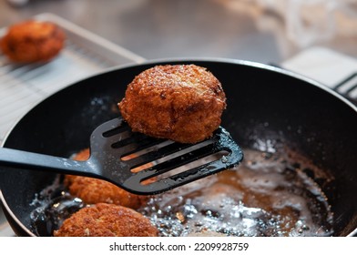 Cooking Homemade Minced Meat Cutlets In A Frying Pan. Japan