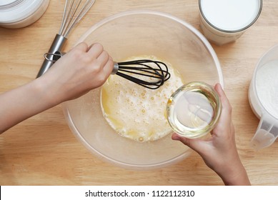 Cooking with Kids. Girl Hand Mixing Ingredient Cook Muffin Dough Wooden Table - Powered by Shutterstock