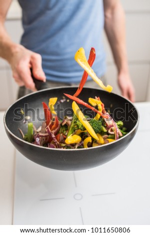 cooking in the kitchen