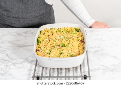 Cooking Macaroni And Cheese With Broccoli In A Casserole Dish.