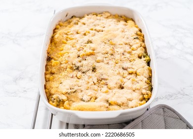 Cooking Macaroni And Cheese With Broccoli In A Casserole Dish.