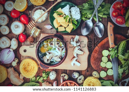 Similar – Image, Stock Photo Female hands making chicken skewers with vegetables for grilling