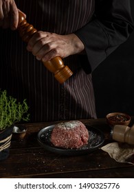 Cooking Minced Meat With Beef And Pork Meat For Burger Cutlet By Cook Chef Hands On Black Background Copy Space.