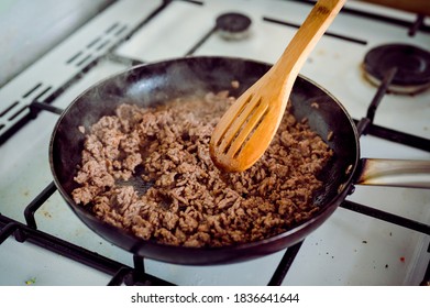 Cooking Minced Meat In A Pan On A White Gas Stow