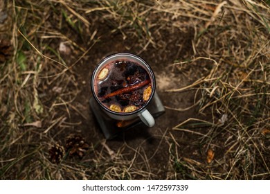 Cooking Mulled Wine In Nature On A Tourist Stove
